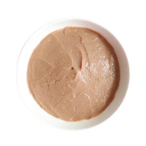 Kit Cat Purr Puree Plus Skin and Coat 60 en plato